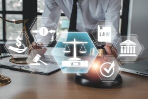 Businessman working with digital icons representing law and justice